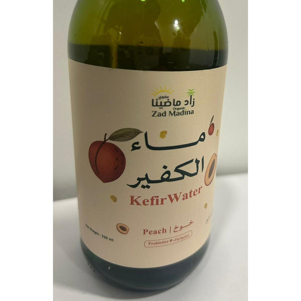 ماء الكفير بنكهة الخوخ العضوي  بروبيوتيك زاد ماضينا 330 مل
